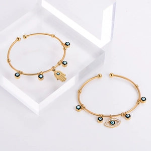 Gold-plated braided cable bracelets with Hamsa Hand and Turkish Evil Eye charms
