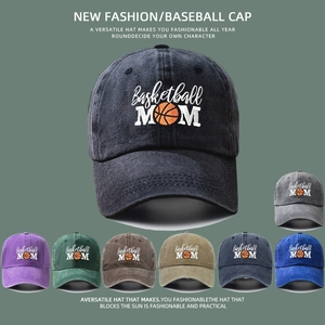 Detail view of cotton baseball caps with Basketball MOM embroidery in various vintage colors