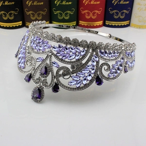 Detail of silver bridal crown featuring purple teardrop crystals and leaf-shaped zircons