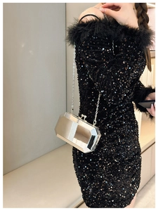 Silver geometric acrylic evening bag with metal chain shown on model in black sequin dress