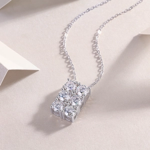 Detailed close-up of S925 silver necklace featuring six brilliant round moissanite stones