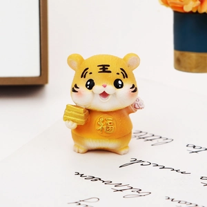 Cute yellow resin tiger figurine holding gold ingot for car interior and desk decor