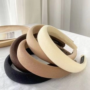Set of four handmade leopard print braided headbands in beige, brown, and black colors