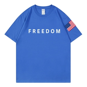 Blue cotton T-shirt with white FREEDOM print and US flag patch on the sleeve
