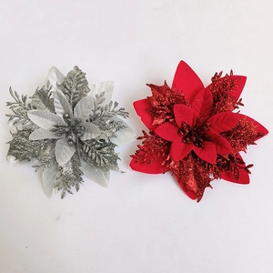 Detail view of 14cm red and silver glitter artificial poinsettia flowers for Christmas decoration