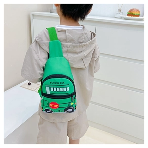 Rear view of a child wearing the green school bus cartoon chest bag with shoulder strap