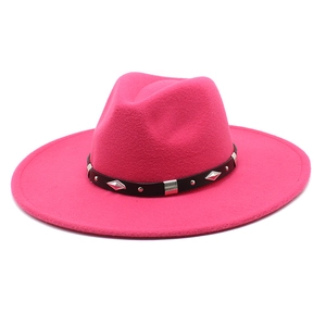 Detail of rose red wool jazz hat with studded black band and 9.5cm wide flat brim