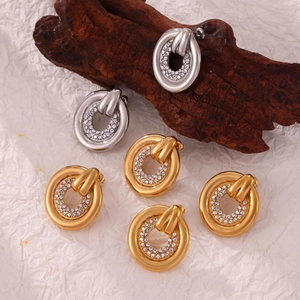 Retro knocker-style earrings with pave-set cubic zirconia in gold and silver finishes
