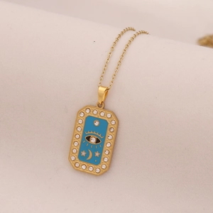 Gold stainless steel necklace featuring a blue evil eye pendant with moon and stars