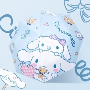 Top view of blue Cinnamoroll umbrella featuring cute cartoon prints and brand logo
