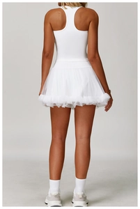 Detailed back view of white racerback sports dress with tiered mesh tutu skirt detail