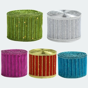 Set of five colorful glitter striped ribbons for Christmas tree decor and gift wrapping