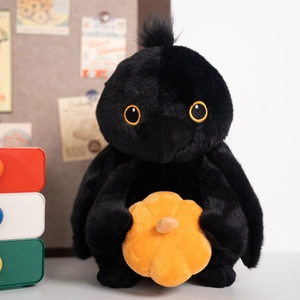 Plush black crow toy holding an orange pumpkin, perfect Halloween gift for children