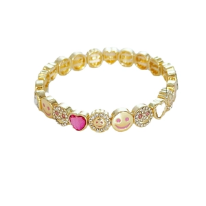 Pink smiley face flower beaded stretch bracelet with heart charms and gold plating