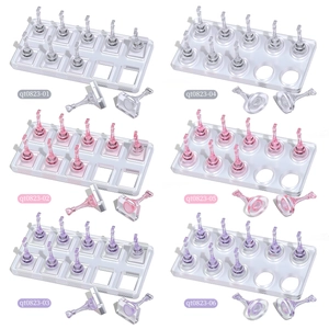 Acrylic nail display stands in clear, pink, and purple colors with magnetic holders