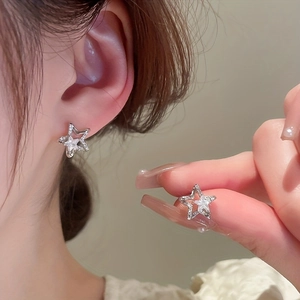 Sparkling star stud earrings with zircon inlay for women in silver minimalist style