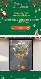 Close-up of golden Christmas wreath window sticker with bells and Merry Christmas text