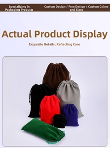 Macro detail of various colorful velvet drawstring pouches in red, black, and blue tones