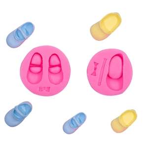 Pink silicone baby shoe fondant molds for DIY cake decorating and bow tie crafts