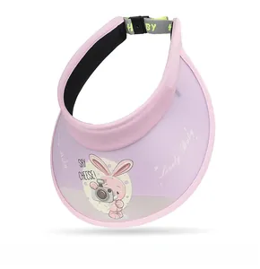 Detail of pink kids sun visor with cartoon rabbit print and adjustable buckle strap