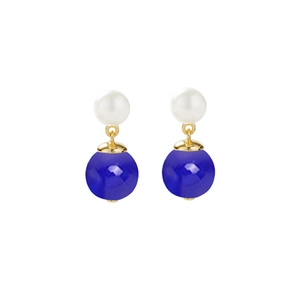 Macro detail of S925 silver earrings with white pearl and blue chalcedony stone drop