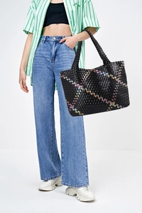 Detail of hand-woven tote bag in black with colorful reflective knit and large capacity