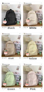 Detailed grid view of six colorful minimalist student backpacks with cute strawberry charms