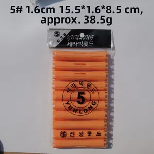 Detail view of orange size 5 hair perm rods in transparent packaging with 1.6cm diameter