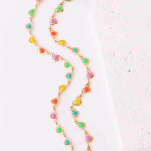 Colorful enamel heart charm necklace in gold finish with vibrant dopamine style charms