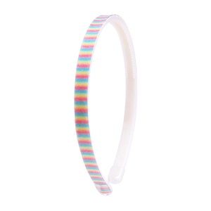 Detail showing colorful rainbow gradient glitter fabric on white plastic headband