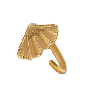 Adjustable golden ginkgo leaf ring in polished stainless steel on white background