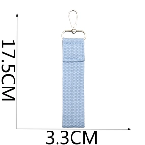 Detail view of light blue fabric ribbon keychain with silver swivel clasp 17.5cm x 3.3cm