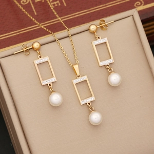 Gold stainless steel jewelry set with crystal rectangle pendants and white pearls