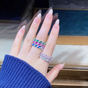 Close-up of luxury 925 silver rings with colorful gemstones and high carbon diamonds