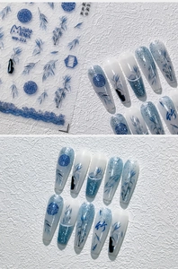 Detail of blue bamboo embossed nail stickers showing traditional Chinese art patterns