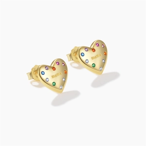 Detailed macro view of S925 silver gold heart stud earrings with colorful stones and MAMA engraving