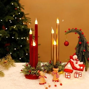Christmas LED candle light with red and gold candles and artificial pine berry base