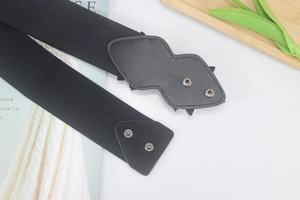 Wide elastic belt for women, black stretch waist cincher with snap button closure.