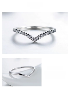 Detailed close-up of a V-shaped S925 sterling silver ring with sparkling pavé zircons
