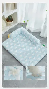 Detail of light blue cooling pet mat with cloud patterns and thickened L-shaped bolster
