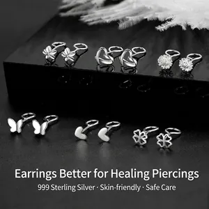 999 Sterling Silver earrings set with flower and heart shapes for ear piercing care