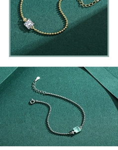 Detail of s925 silver bead bracelets with square paraiba tourmaline pendants in gold and silver