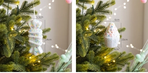 Detail of white glitter candy and cupcake ornaments on a decorated Christmas tree