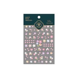 Floral spring nail art stickers with cherry blossoms, hearts and birds for DIY manicures