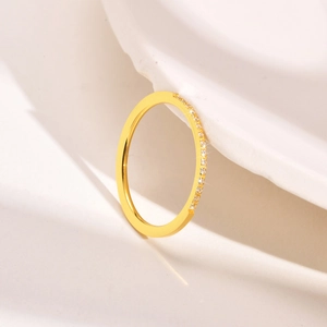 Minimalist 1mm gold titanium steel ring with colorful zircon stones on white art stand