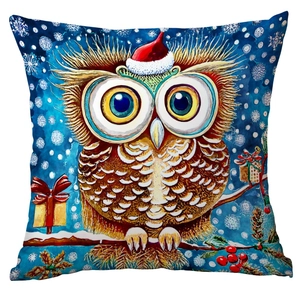 Close-up of Christmas owl pillow case with watercolor owl wearing a red festive hat