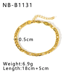 Detail view of gold Figaro chain bracelet with lobster clasp and adjustable tail chain