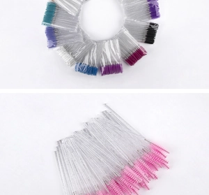 Macro shot of colorful spiral eyelash brushes with transparent glitter crystal handles