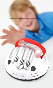 Detail view of party polygraph toy with silver finger slots and mode selector buttons