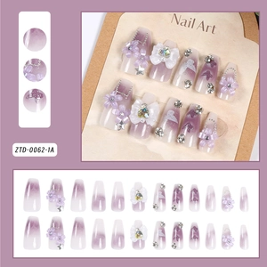 Detail of 24pcs purple gradient press-on nails with 3D floral and bow rhinestone designs